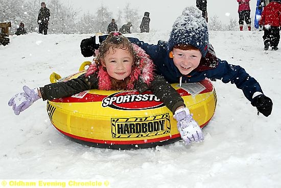 NOT everyone was inconvenienced by the weather: Lola Slack (5) and Noah Moldon (9) enjoyed themselves at Tandle Hill. 