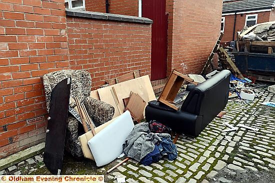 HOUSEHOLD waste: dumped furniture lies abandoned on the cobbles of Clarksfield