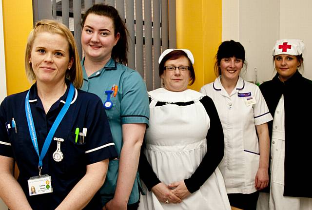 ON parade... (from the left) Louise Lewis, senior sister at North Manchester; Jess Pollard, healthcare cadet at North Manchester; Phyll Atkinson, RCN steward and theatre practitioner at North Manchester dressed as Florence Nightingale; Gillian Heath, third-year student and Billie Barratt, (second year) in 1940s uniform.