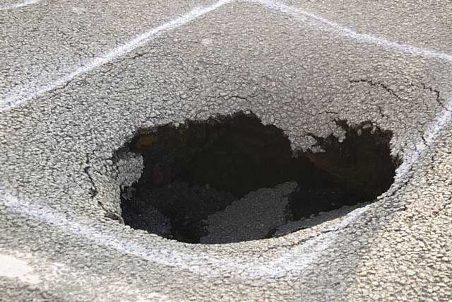 CLOSE call... children were jumping on the sinkhole in Chadderton just ten minutes before it caved in.