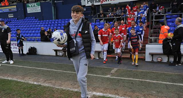 Leading the way... Ellis' brother Oliver leads out the teams