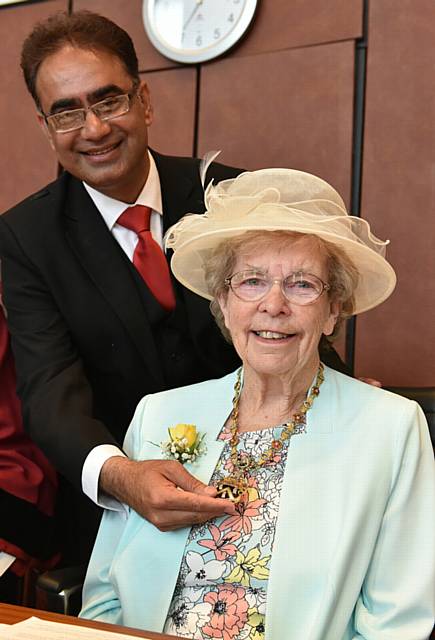 RETIRING Mayor Councillor Ur -Rehman invests Mayoress Di Heffernan