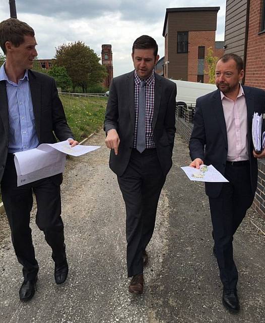 PLANNING the future... Jim McMahon MP discusses a vision for Freehold with Oldham Council officers Darren Jones (left) and Bryn Cooke (right).