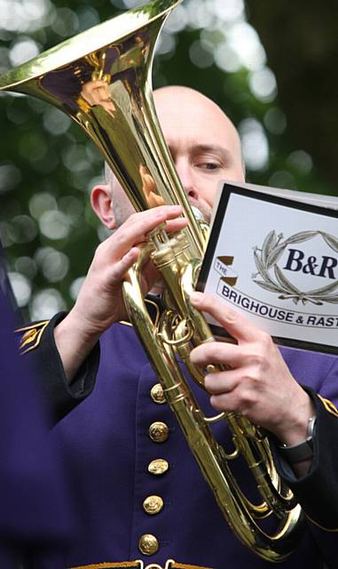 Brighouse and Rastrick brass band performing in the Whit Friday brass band contest at Grotton.
