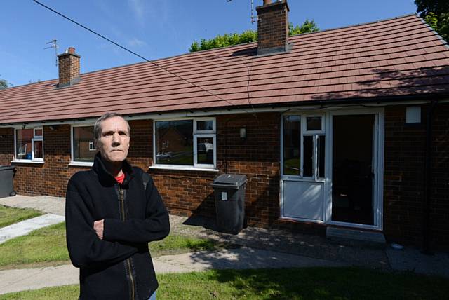 UNHAPPY ... James Fleming fears moving back into his home after a fire last year