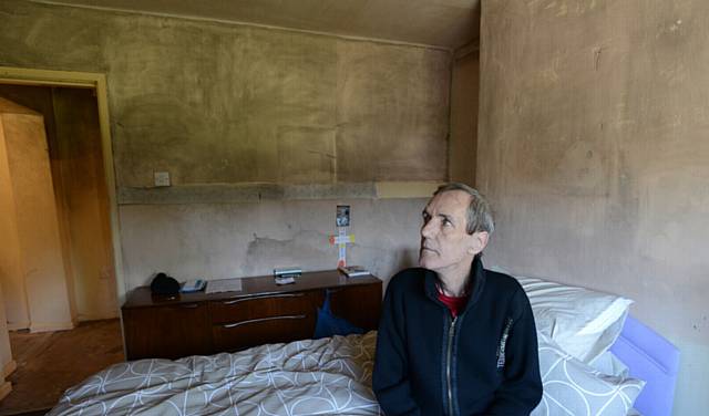 UNHAPPY ... James Fleming fears moving back into his home after a fire last year