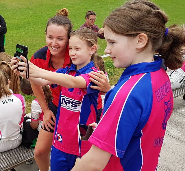 FRANKIE Holt (left) and Samantha Peckett, of Heyside Hyenas, with Thunder's Kate Cross