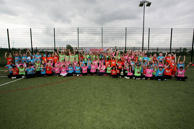 School students from around Oldham gathered at Hathershaw college to practice their dance routine for the rugby league summer bash in Blackpool, they will be dancing at the summer bash where Oldham rugby league club will be playing.