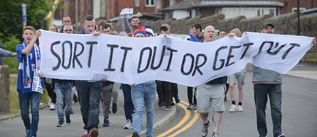 ENOUGH is enough . . . fans march down Sheepfoot Lane in protest over the running of the club