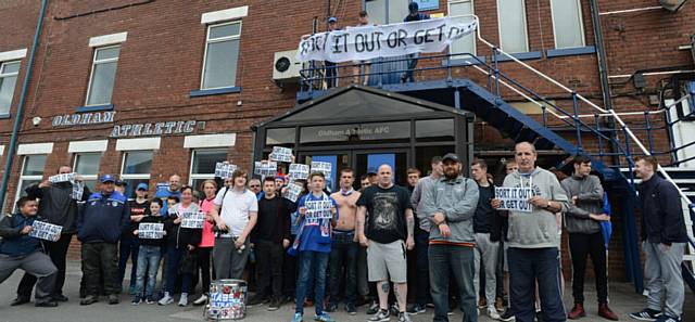 MAKING their voices heard . . . fans gather outside the Main Stand