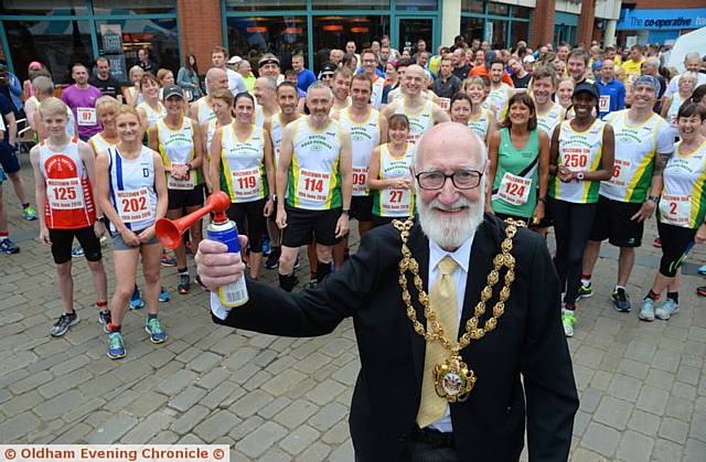 READY for the off . . . Mayor Councillor Derek Heffernan about to sound the race hooter