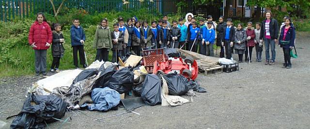 YEAR 4 pupils ready for action as the Coppice Academy clean-up gets into full swing.