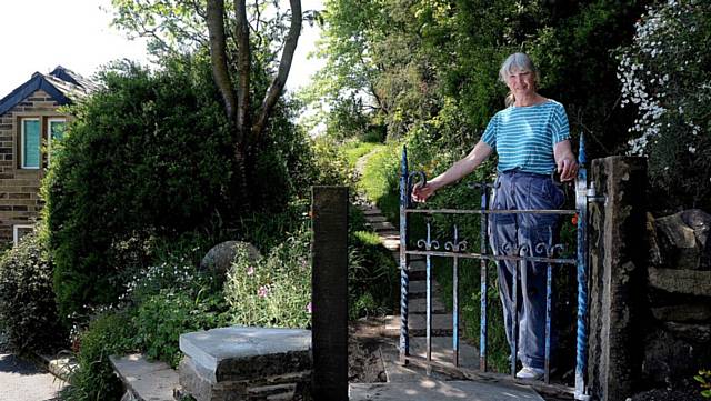 HELEN Campbell and her garden at Crib Lane, Dobcross
