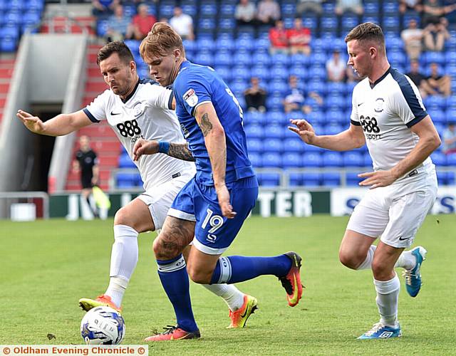 MAKING HIS MARK . . . Lee Erwin causes problems as he looks to get another Athletic attack going on a hot night at SportsDirect.com Park