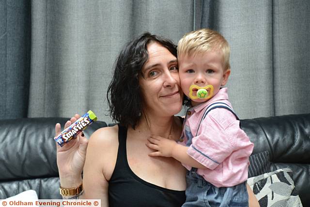 Ally Ziemniak, the sister of Lisa Parkisson has organised a fundraising event, a Smartie Party to raise money to pay for legal experts to examine the causes of Lisa's death. Pic shows her with Lisa's son Zac.