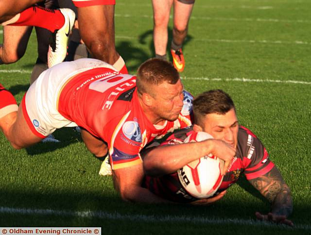  FINISHING TOUCH . . . Kenny Hughes bursts through the Sheffield defence to score