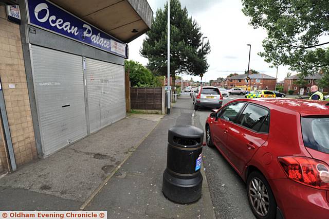 RTA on Trough Gate, Hollins. Blue car shunted red car into a man who was unloading from his silver Volvo to his takeaway 'Ocean Palace'.