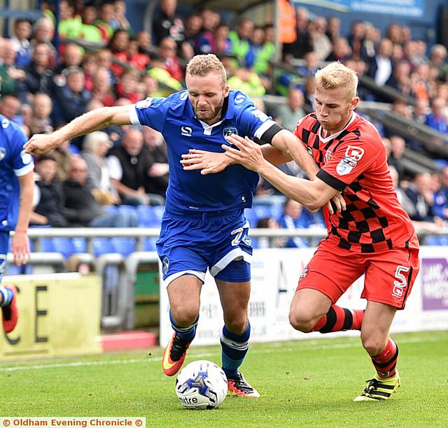 LETTING FLY . . . Athletic's Ryan Flynn unleashes a shot at goal