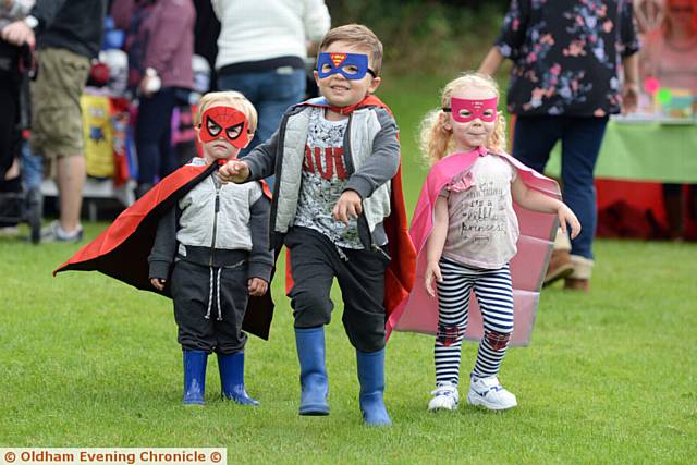 Dr Kershaw's Duck Race. Super heroes (l-r) Jorge Morley (2), Zack Morley (4) and EllieHand (3) enjoy the day.