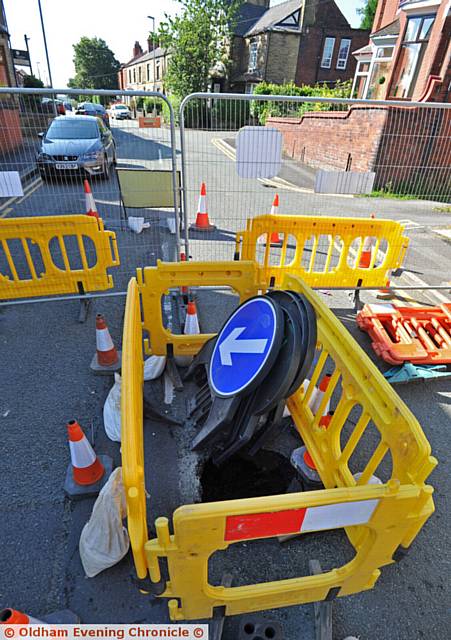 Sinkhole on Church Road in Shaw. Near junction to Rochdale Road.