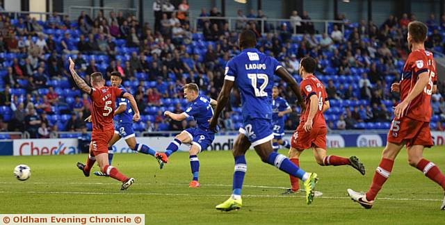 GREAT STRIKE . . . Billy Mckay puts Athletic in front from outside of the penalty area