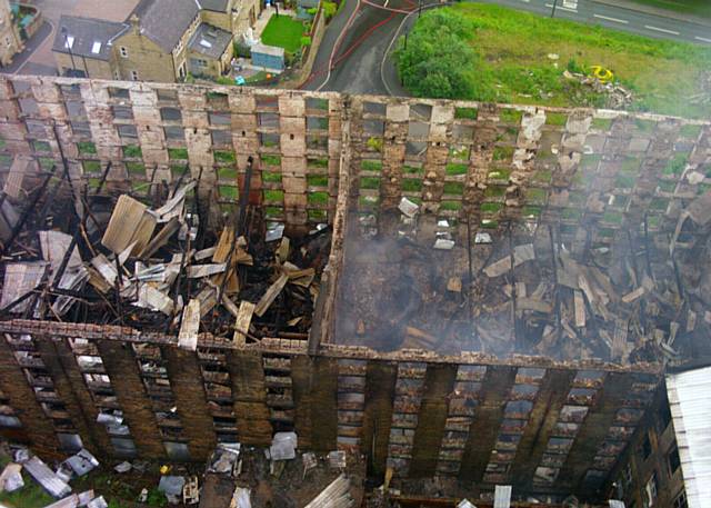 Update on fire at Bailey Mill in Delph. PIC shows image from Greater Manchester Fire and Rescue Service Air Unit drone.