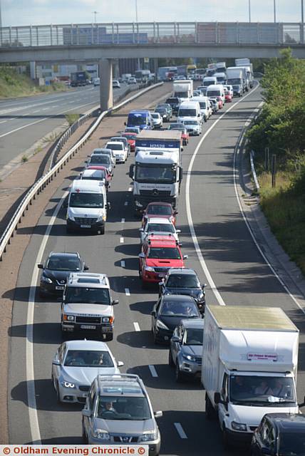 Overturned lorry on the M60 northbound, near Chadderton caused chaos on and around the motorway.