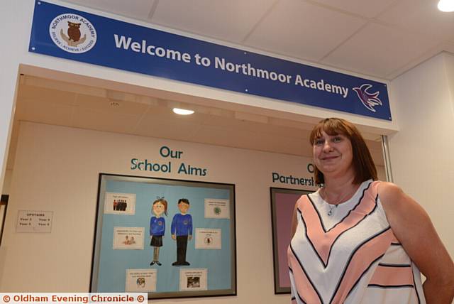 Northmoor Academ Teaching Assistant Lynda Clanachan at the Academy entrance.