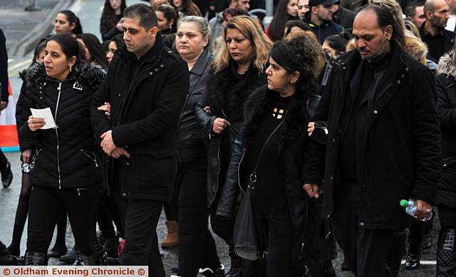 BOTH sets of parents lead the procession on Copsterhill Road