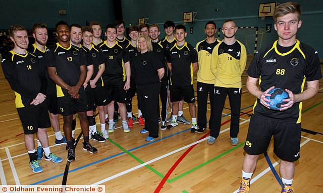 READY FOR ACTION...captain Ryan Goodwin (right) and coach Donna Hankinson (centre) line up with the North East Manchester Hawks team before their match against Olympia at Oldham Sports Centre