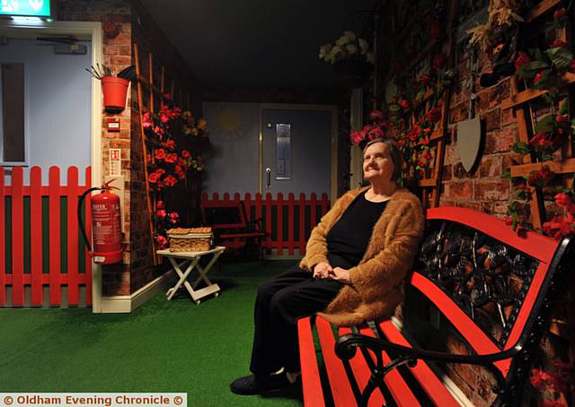 TAKING it easy . . . resident Emilie Rakhit in the indoor sensory garden