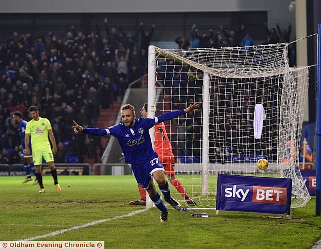 THAT SEALS IT: Ryan McLaughlin wheels away in celebration after doubling his side's lead. 