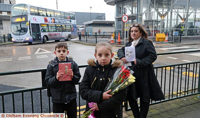 ANN Kerridge's grandson Jake Healey (9), grand-daughter Hollie Healey (10) and daughter Sharon Kerridge visit the spot to leave flowers
