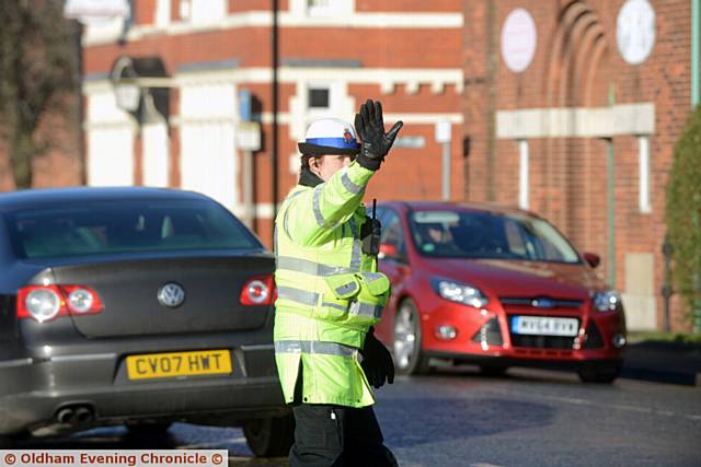 NO way through . . . an officer pulls over another driver
