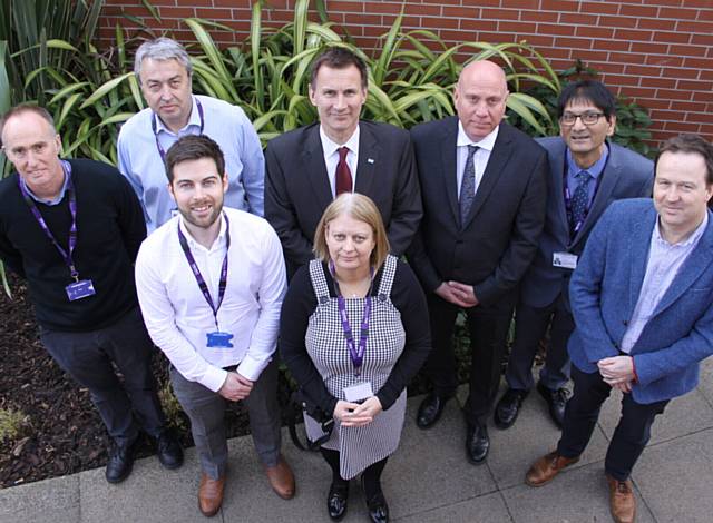 VISIT . . . At Pennine Care are (back l-r) Mike Liffen, Dario Griffiths, Jeremy Hunt, Michael McCourt, Dil Jauffur, Dr Henry Ticehurst. Front: Mark Hepburn and Fiona Christopher