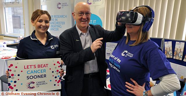 EVENT . . . (l-r) Jessica Turner, Cancer Research UK Senior Cancer Awareness Nurse, Councillor Eddie Moores and Stacey Arnold, event organiser, at Civic Centre, Oldham