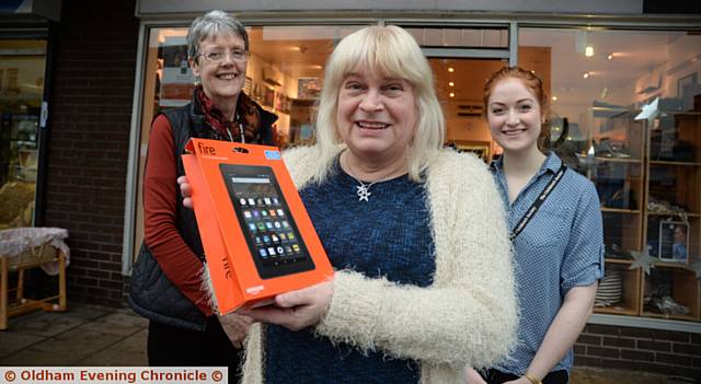 LINDA Oakes (centre) with shop manager Carol Forshaw and (right) volunteer Zoe Halliwell