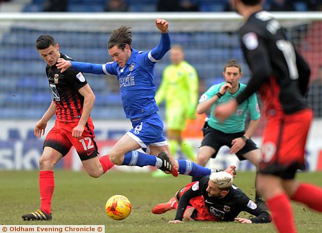 ATHLETIC midfielder Aiden O'Neill takes a tumble