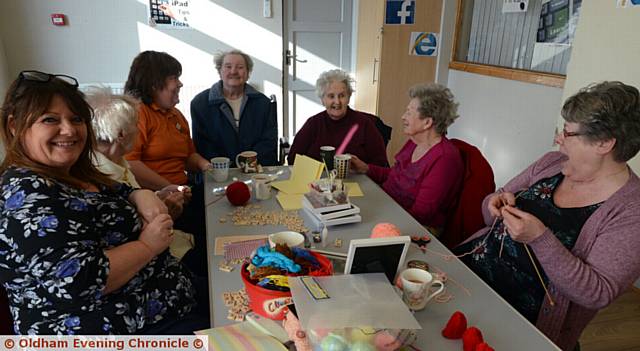 THE craft group at the Chadderton Over 60s Centre knit and crochet mini hats to adorn the tops of Innocent Smoothie bottles. Pictured, left, is Maggie Hurley from Age UK with big knitters
