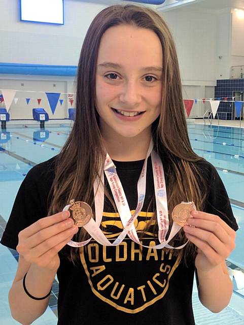 BRONZE . . . Ella Price with her two bronze medals