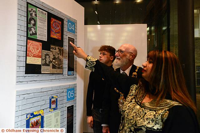 CELEBRATION . . . Youngsters at the 25th anniversary exhibition of Peshkar at Gallery Oldham are presented with certificates after completing nationally recognised arts awards. Left to right, Paige Stott, Peter Wood, Grace Evans, Oldham Mayor Councillor Derek Heffernan, Phelan Geoghegan, Lauren Wilson, Youth Mayor TJ Turner, Steph Meskell-Brocken, Peshkar engagement manager, Erin Baynes and Hamza Hanif
