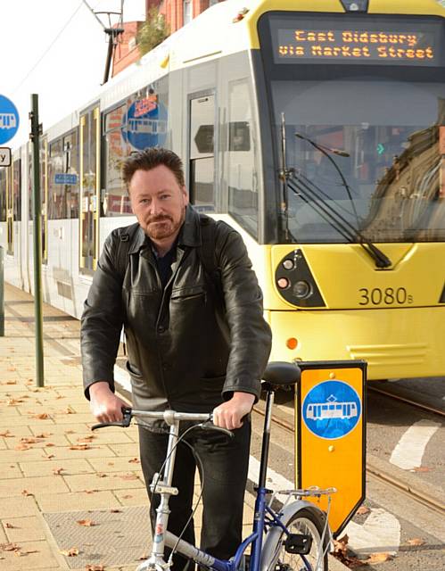 IN THE SADDLE . . . Christian Black with his Bike Back to Work bike