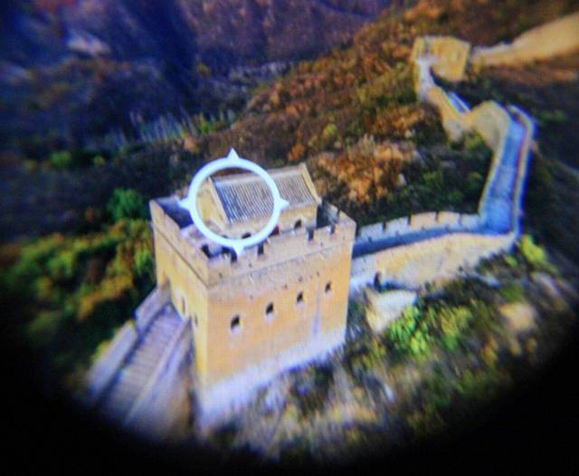 ABOVE: Looking through the viewer to the Great Wall of China