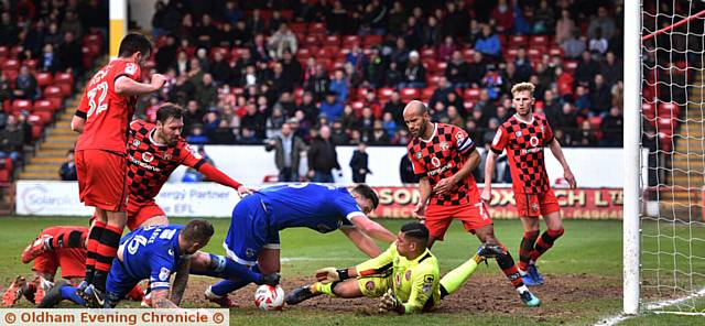 A LATE scramble saw Peter Clarke and Anthony Gerrard in the thick of the action