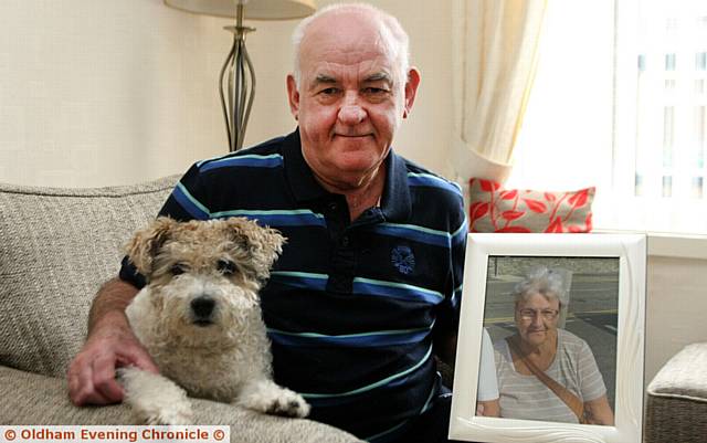 FULL of praise for the health system . . . David Ashworth with a picture of Barbara and Dotty, the family dog