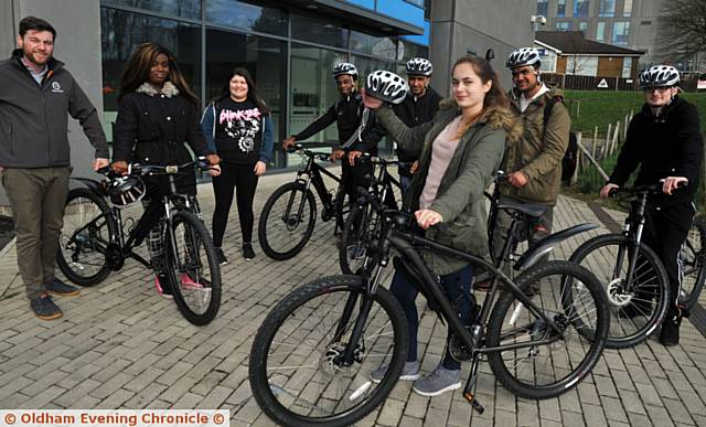 ON THEIR BIKES . . . From left, personal development advocate Ian Wheeler with students