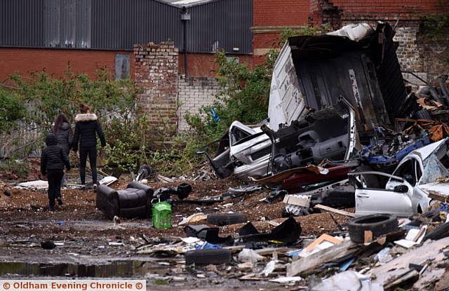 Children trespass on Maple Mill site, Hathershaw.