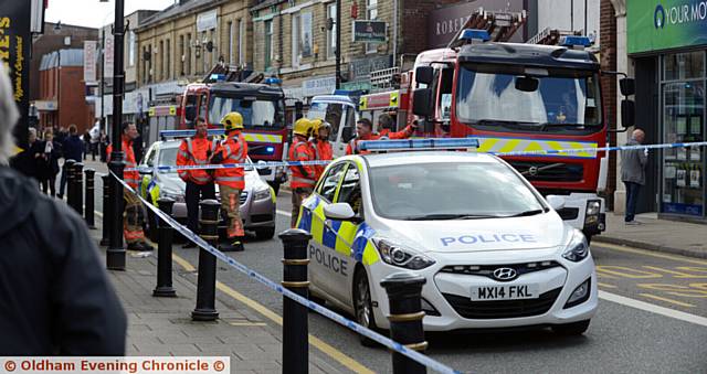 RAID drama . . . outside 

Barclays Bank in Shaw