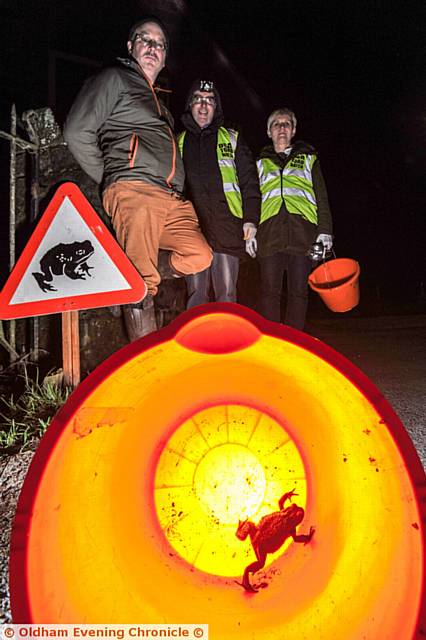 TOAD patrollers near Kiln Green church in Diggle. Left to to right: Nick Cox, John Newman and Lynn Newman