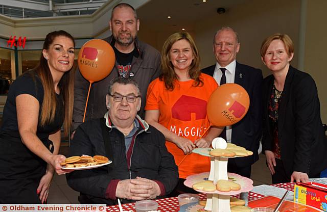 FROM the left, Michelle Harpin (events company), Joseph Cook and Paul Cook, Laura Tomlinson (Maggie's), Mike Flanagan (Spindles manager) and Katie Bennett (Spindles marketing manager) the Kitchen Table Day in at Spindles shopping centre